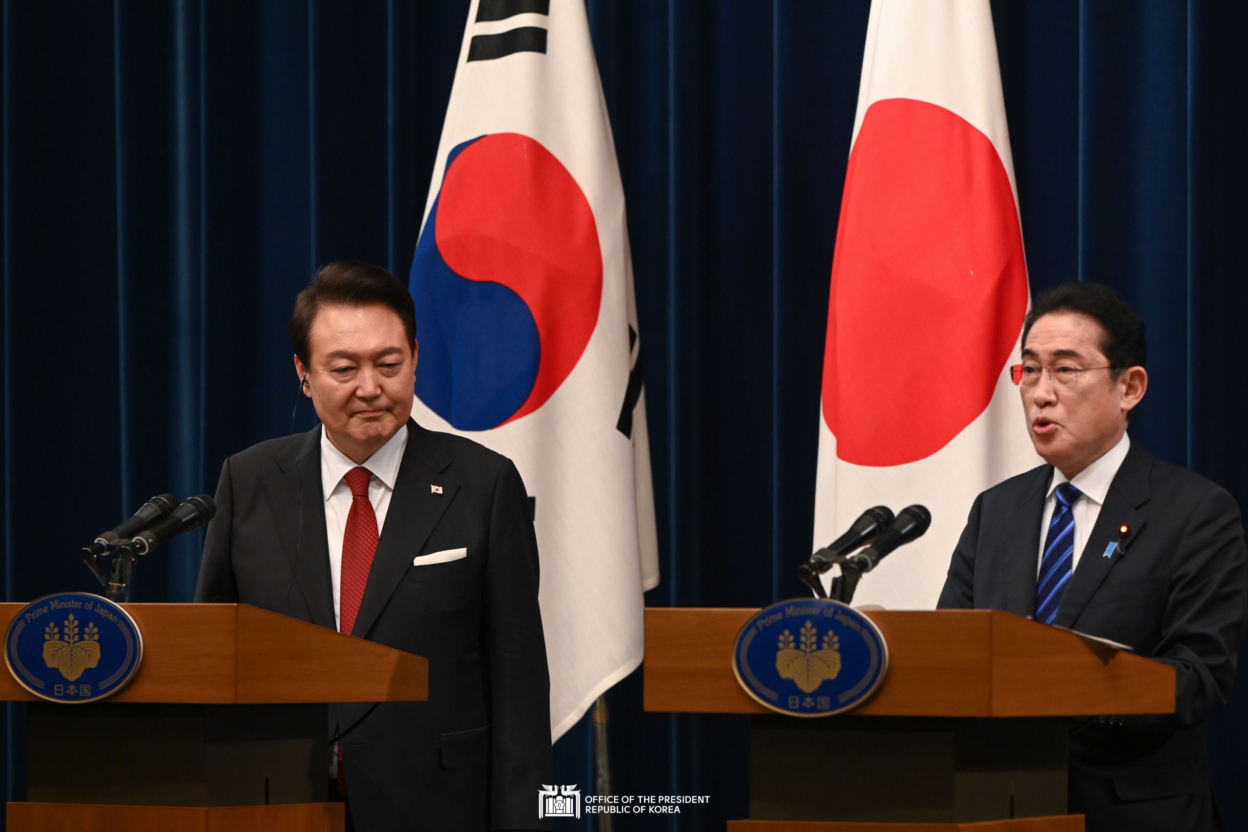 Attending a joint press conference following the Korea-Japan summit slide 1