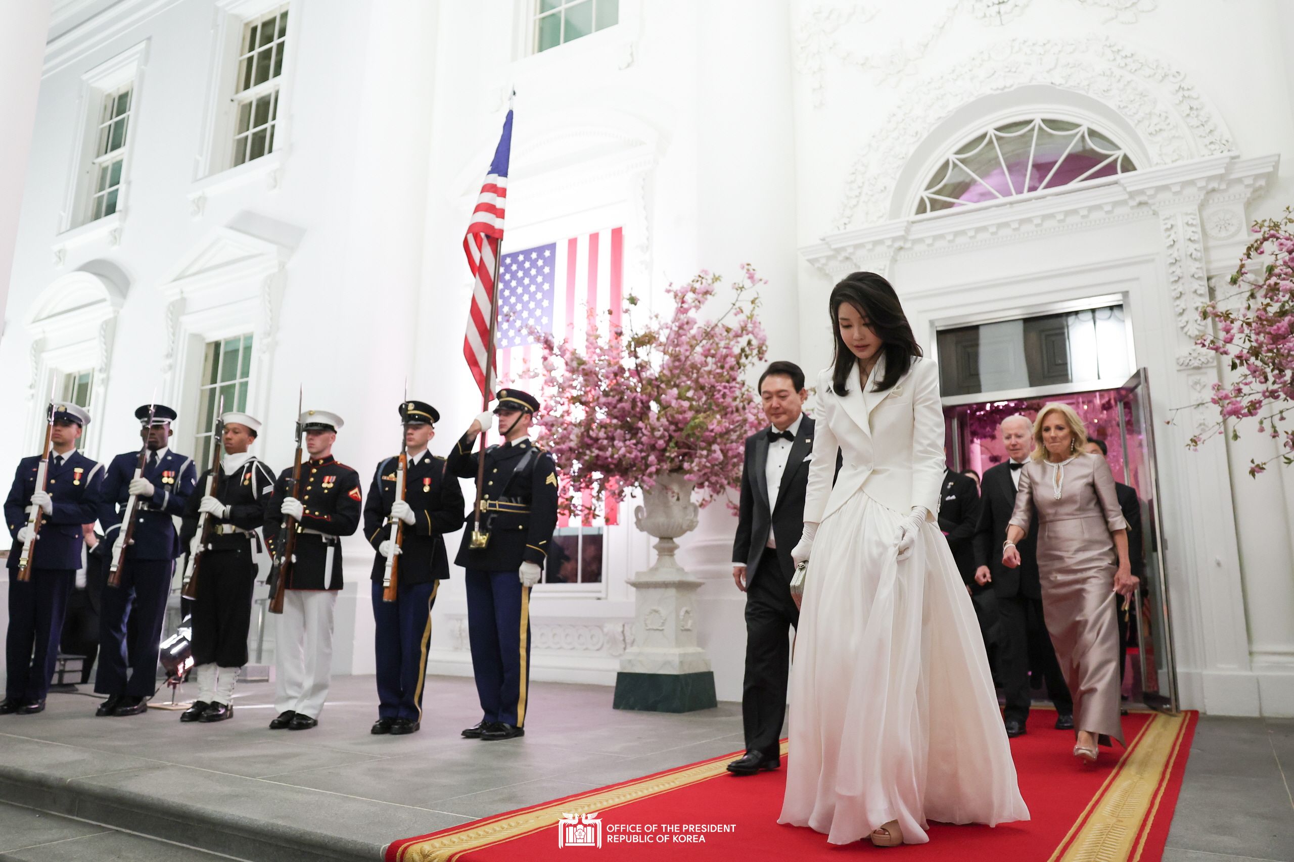 The President and First Lady attending the State Dinner hosted by the U.S. President and First Lady Slide24